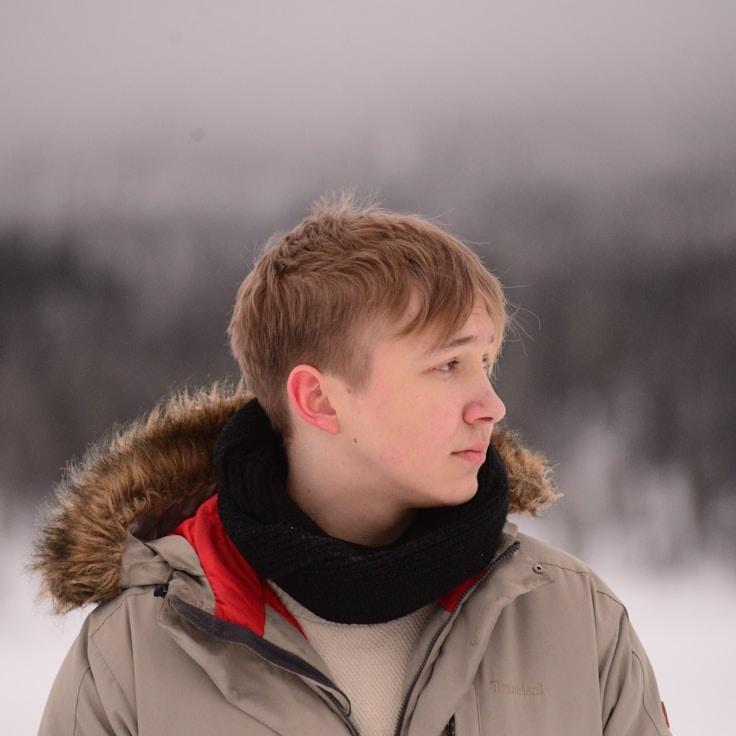 Kaveri Mehta, Lead Design Curator at SoftGardenVault, reviewing corporate floral arrangements